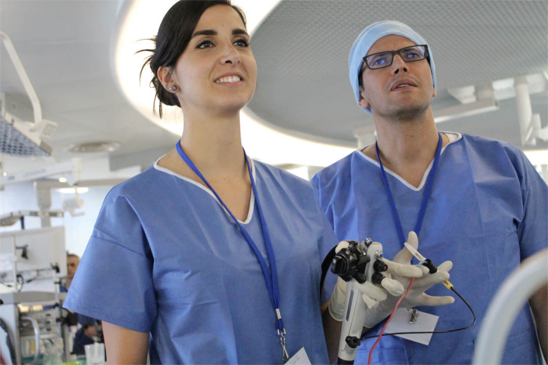 students manipulating an endoscope